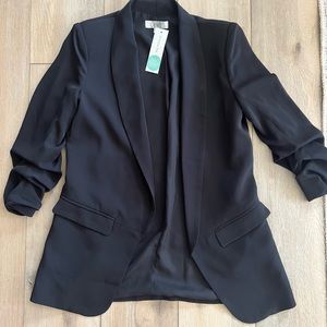 Ovi blazer jacket in black. New with tags. Never worn. Size small.